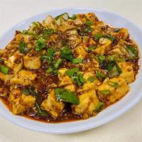 K12. Mapo Tofu · Soft tofu with ground pork & scallions. Spicy.
