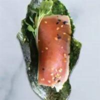 Seared Ahi Sushi Taco · sesame-crusted yellowfin tuna, avocado, wasabi aioli, soy-wasabi vinaigrette, daikon sprouts