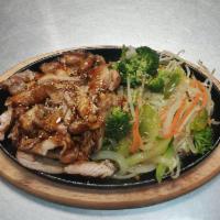 D1. Chicken Teriyaki Dinner · Grilled chicken glazed with teriyaki sauce.