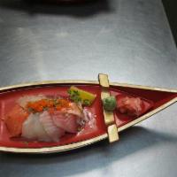 OR6. Chirashi · Raw. Various slices of fish over sushi rice.