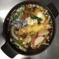 N5. Nabeyaki Udon Noodle Soup · Udon noodle soup with vegetable, a shrimp tempura poached egg, chicken served in a hot pot.