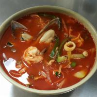 N11. Spicy Seafood Udon Champon Noodle Soup · Seafood udon cooked with hot chili sauce.