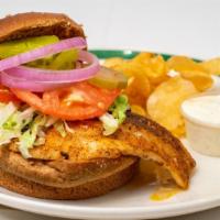 Fresh Fish Sandwich · Grilled grouper and dill tartar sauce (l,t,o,p on the side), served with chips, slaw, or fre...