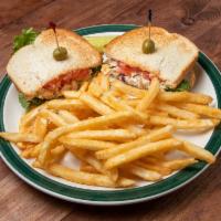 Roasted Chicken Salad Sandwich · Chicken salad sandwich served with chips, slaw, or french fries on choice of whole wheat or ...
