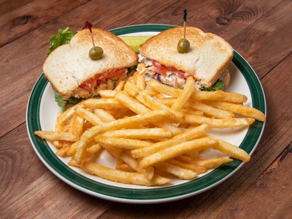 Roasted Chicken Salad Sandwich · Chicken salad sandwich served with chips, slaw, or french fries on choice of whole wheat or sourdough bread. Add bacon, and cheese for an additional charge.

