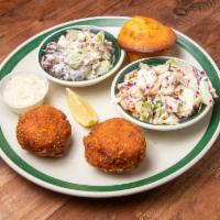Salmon Croquettes Special · 2 salmon croquettes serves with dill tartar sauce. Blue plate served with 2 sides and a corn...