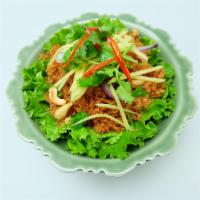 Yum Pla Duke Foo · Crispy catfish salad. Crispy catfish, shredded mango, cashew nuts, and red onion with chili-...