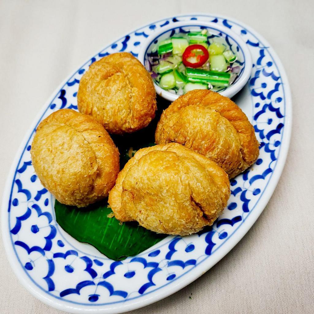Curry Puffs · Minced chicken, potatoes and onions cooked with curry powder and served with sweet cucumber relish.