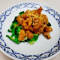 Praram · Peanut sauce. Sauteed fried meat with peanut sauce and steamed assorted vegetables. Served w...