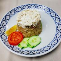 Crab Fried Rice · Crab meat, onion, scallions, tomato, and fried egg and mixed with fried rice.