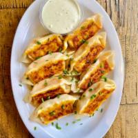 Buffalo Chicken Dumplings · February special: buffalo chicken dumplings with organic chicken, celery and carrots. Served...