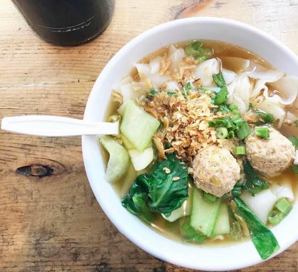 12-hour Organic Chicken Bone Broth Noodle Soup · 12-hour simmered organic chicken broth with fresh rice noodles, housemade organic chicken meatballs, bok choy, and topped with crispy shallots.