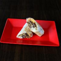 Breakfast Burrito · Comes with your choice of steak or Mexican sausage (chorizo) and eggs with beans, cheese and...