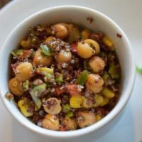 Chickpea Quinoa Salad · Charred chickpeas, red quinoa, roasted corn, diced peppers, scallions, cilantro, lime and ho...