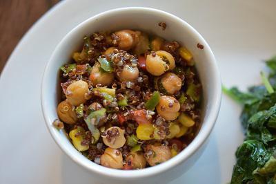 Chickpea Quinoa Salad · Charred chickpeas, red quinoa, roasted corn, diced peppers, scallions, cilantro, lime and honey.