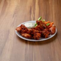 12 Pieces Wings · Served with fresh celery, carrots and bleu cheese.