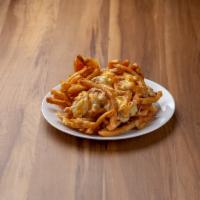Crabby Fries · A mound of fries smothered with our award winning creamy crab dip, topped with mixed cheeses...