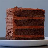 Chocolate Fudge Cake Slice · Layers of decadent chocolate cake filled and iced with a rich chocolate fudge frosting.
