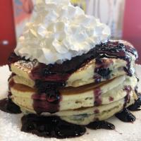 The Blue Jay · Lemon blueberry griddlecakes, blueberry compote and whipped cream.
