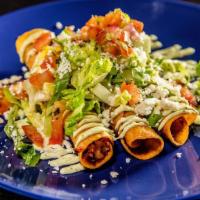 Taquitos Dorados · Your choice of 3 chorizo, chicken, or veggie fried taquitos. With guacamole, jalapeño cilant...