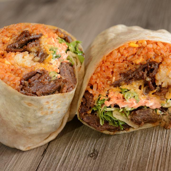 Burrito Meal Kit · Enjoy our Seoul Taco Burrito at home. This kit comes with your choice of protein, kimchi fried rice, carrots, green onions, seoul sauce, wasabi sauce, sour cream, sesame vinaigrette salad mix,  & flour tortillas. Family meals kits feed four people.