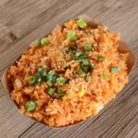Kimchi Fried Rice · Mixed with our kimchi slaw topped with og kimchi, green onion, and sesame seeds. Add protein...