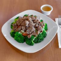Thai Pan Steak House Special · Slice marinated grilled beef served with vegetables and special dip.