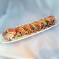 Sun Shine Roll · California roll, topped with fresh salmon and sliced lemon.