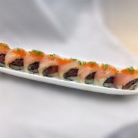 Asahi Roll · spicy hamachi top w/ white tuna, green onion, tobiko