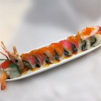 Drunken Dragon Roll · Ama-ebi, shrimp tempura and cucumber, topped with tuna, salmon, white tuna, tobiko and a sid...