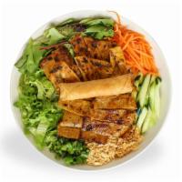 Vermicelli Phenomenal · Rice vermicelli noodles served with charbroiled pork/chicken and (1) pork egg roll; served w...