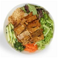 Vermicelli with Charbroiled Pork · Rice vermicelli noodles served with charbroiled pork; served with cucumber, spring mix, pean...