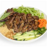 Vermicelli with Charbroiled Beef · Rice vermicelli noodles served with charbroiled beef; served with cucumber, spring mix, pean...