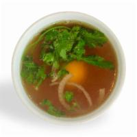 Broth with Egg · Small cup of beef broth served with soft boiled egg