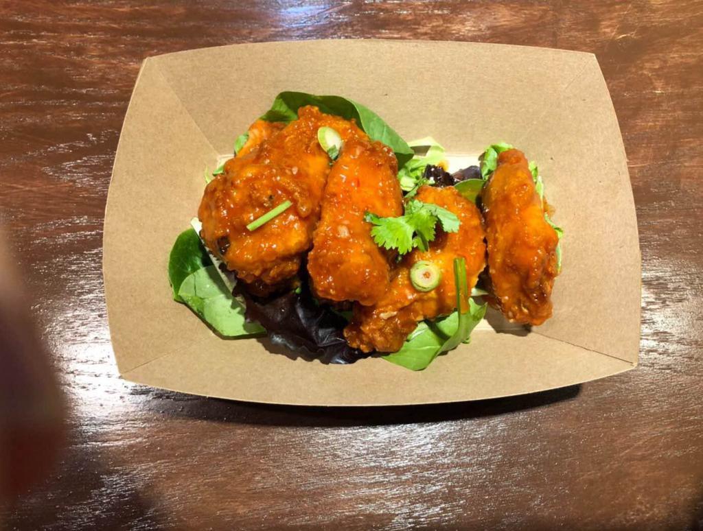 Sriracha Wings (6pcs) · Deep fried chicken wings with Spicy siracha & Sweet chili sauce.