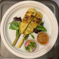 Grilled Chicken Satay · grilled marinated chicken with peanut and cucumber sauce