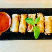 Vegetable Spring Rolls (6pc) · Homemade crispy Vegetable Spring Rolls  with sweet chili sauce.