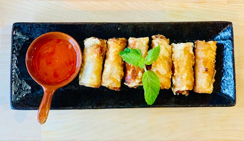 Vegetable Spring Rolls (6pc) · Homemade crispy Vegetable Spring Rolls  with sweet chili sauce.