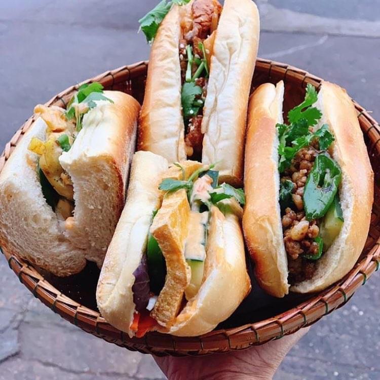 Grilled pork sandwich · Vietnamese style sandwich served with cucumber, daikon, carrot and cilantro with special house sauce and jalapeno.