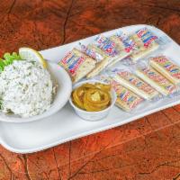 Fish Dip · Locally smoked fish spread served with crackers and jalapenos.