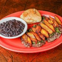 Churrasco Skirt Steak · Perfectly marinated and tenderized skirt steak grilled to perfection, topped with plantains ...