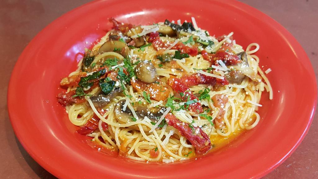 Capellini Sundried Tomatoes Mush Pasta · Capellini pasta, sun dried tomatoes, mushrooms, garlic, olive oil sauce and Parmesan cheese.