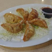 Gyoza (6 Pieces) · Deep-fried beef and veggie potstickers. Served with gyoza sauce.