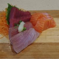 Sashimi Appetizer (6 Pieces) · 6 slices of raw fish (2 salmon, 2 tuna, 2 white fish).
