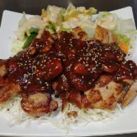 Spicy Chicken Entree · Grilled boneless chicken over cabbage bed with spicy teriyaki sauce and sesame seeds.
Served...