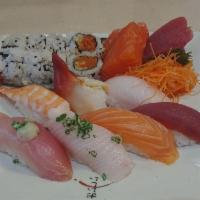 Sushi and Sashimi Dinner · 7 pieces chef-choice nigiri, spicy tuna roll, 3 pieces salmon sashimi, and 3 pieces tuna sas...