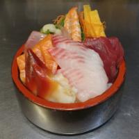 Chirashi Sushi · Chef-choice variety of sashimi over sushi rice. Served with miso soup and salad.