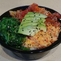 Poki Bowl · Comes with sushi rice topped with imitation crab, avocado, wakame, sesame seeds, masago, and...