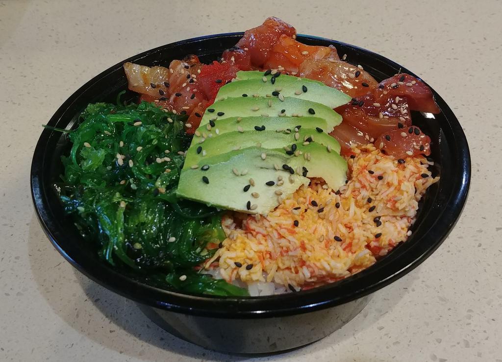 Poki Bowl · Comes with sushi rice topped with imitation crab, avocado, wakame, sesame seeds, masago, and chopped salmon, tuna, and hamachi. Sauced with customer's choice of spicy or not-spicy house sauce. Customer has the option to add spring mix salad or replace the rice with spring mix salad. Not served with any soup or salad.
