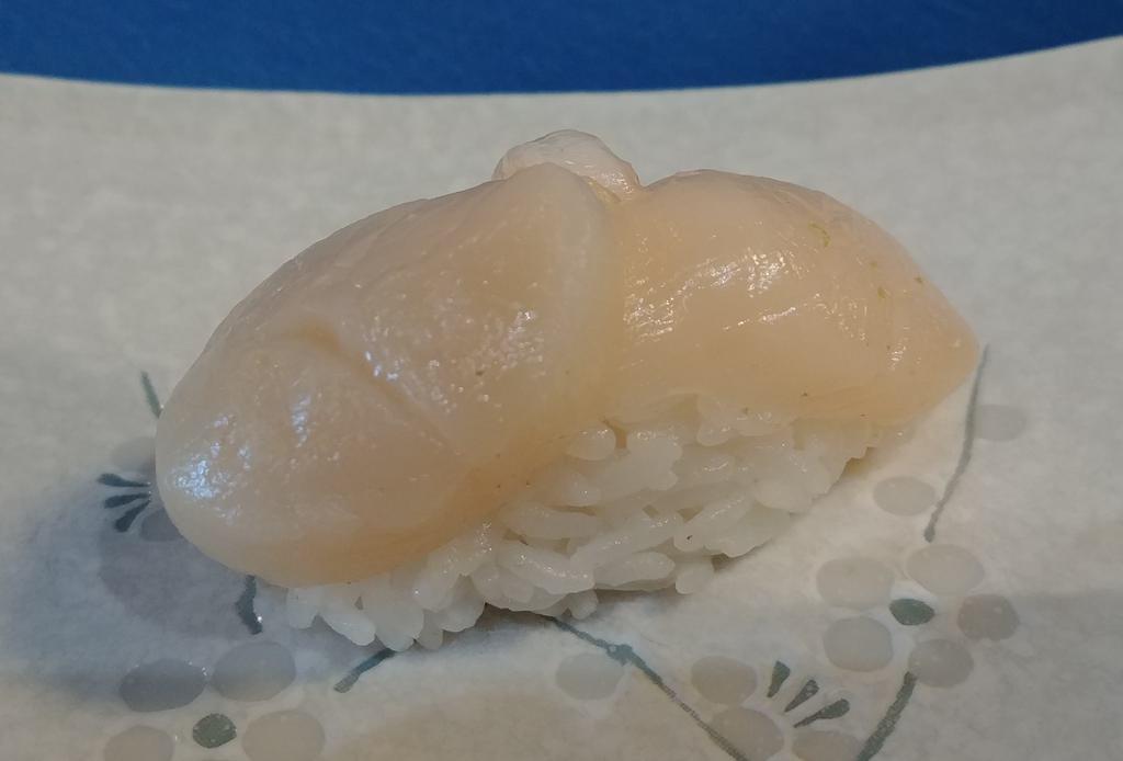 Hotate Nigiri · Japanese hokkaido scallop, sushi rice.